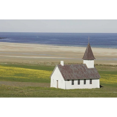Iceland Isolated Christian church near the beach